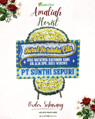 Papan Bunga Duka di Tebing